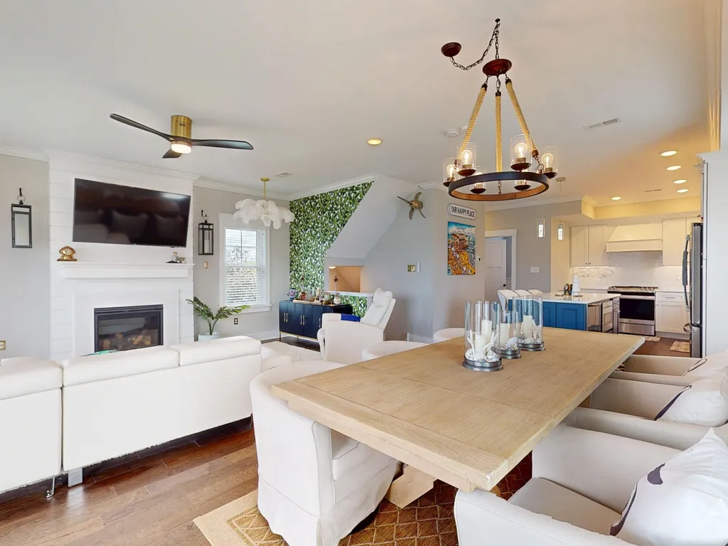 Open concept family room, dining and gourmet kitchen