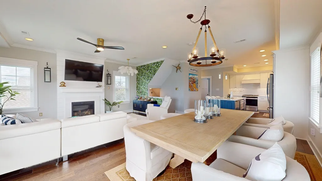 Open concept family room, dining and gourmet kitchen