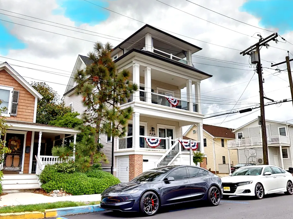 Single-family home with 2 dedicated off-street parking spots behind the house, plus 2 ADA-accessible spots in front (decal required).