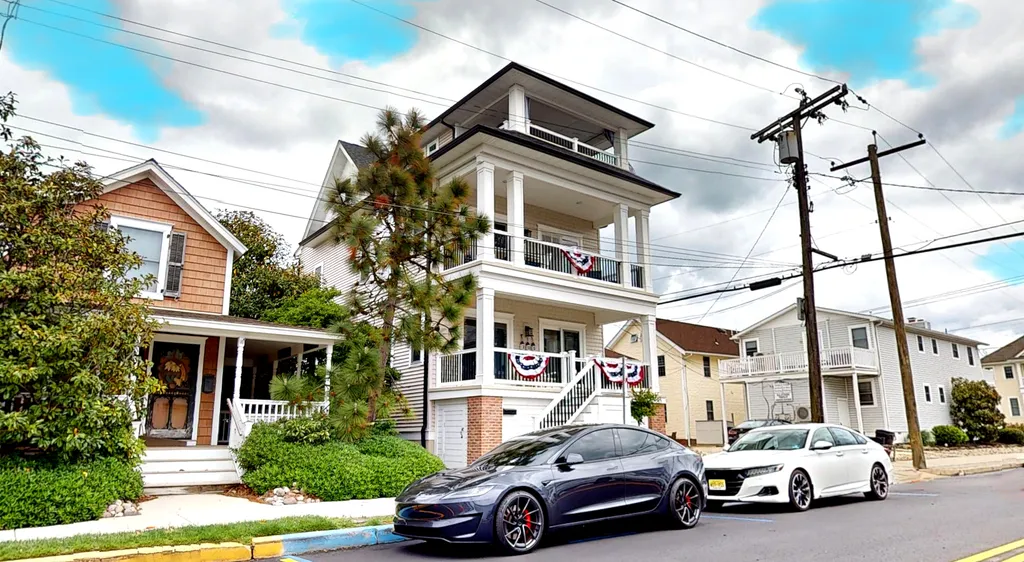 Single-family home with 2 dedicated off-street parking spots behind the house, plus 2 ADA-accessible spots in front (decal required).