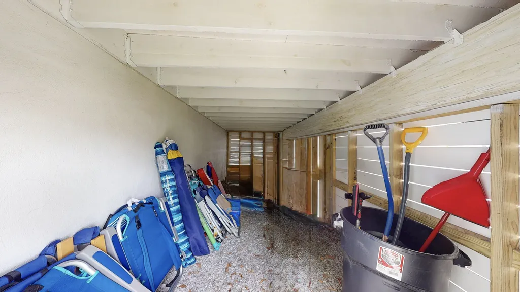 Dry storage area for beach chairs (12 provided) and beach cart