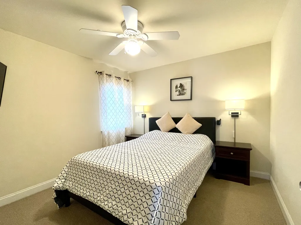 Fourth bedroom with a queen bed