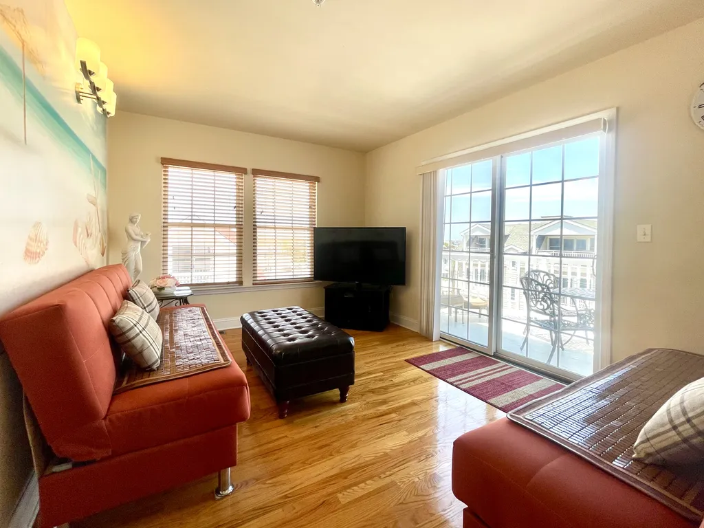 family room in 3rd floor with 2 sofa beds