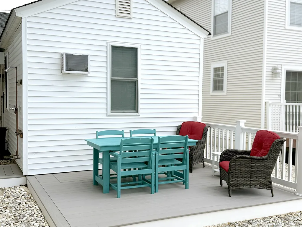 Back patio features seating for 6 plus a grill