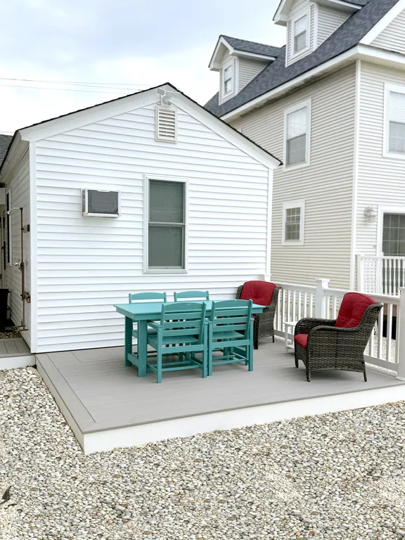 Back patio features seating for 6 plus a grill