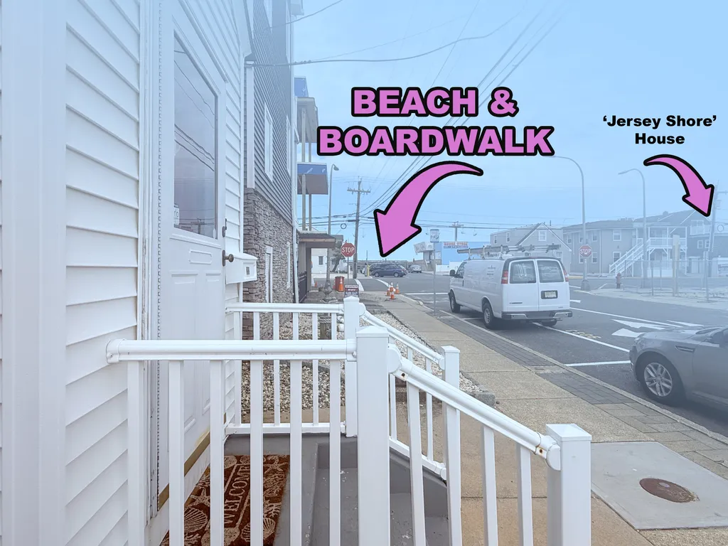 Beach and boardwalk can be seen from cottage porch.
