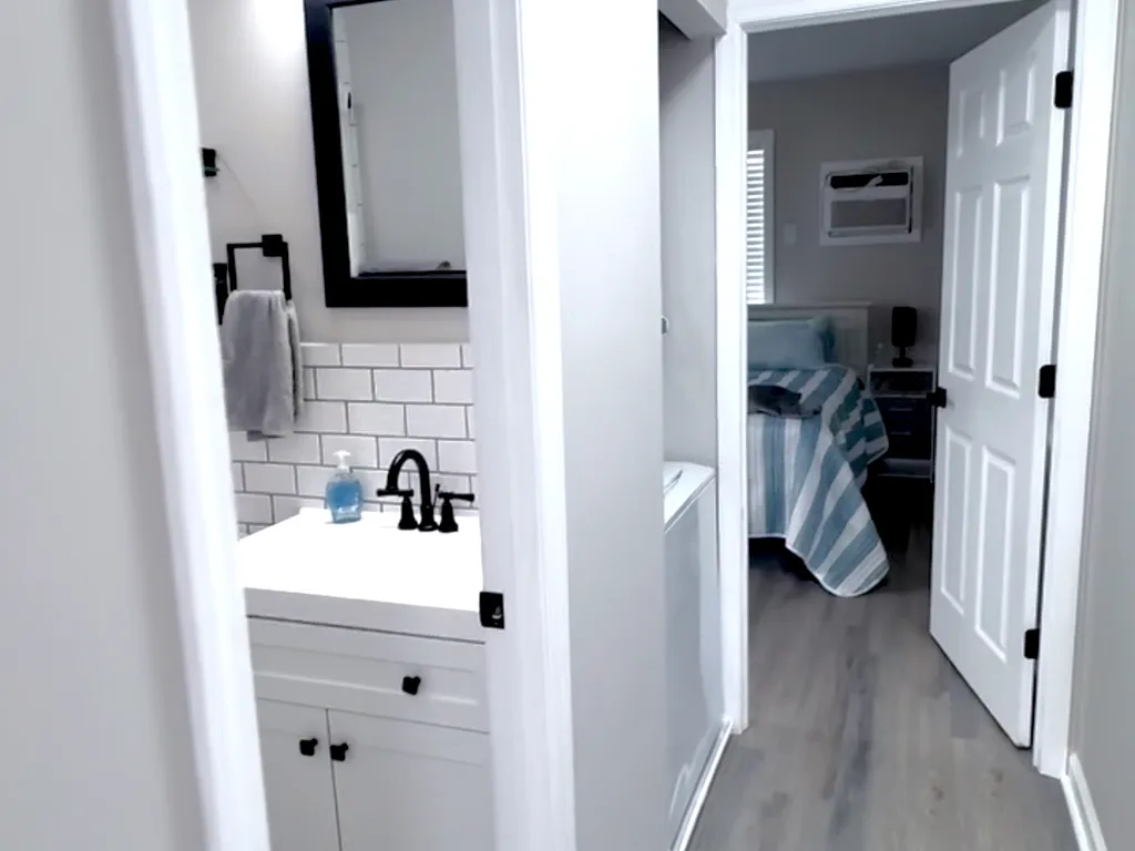 long hallway features door to sideyard.