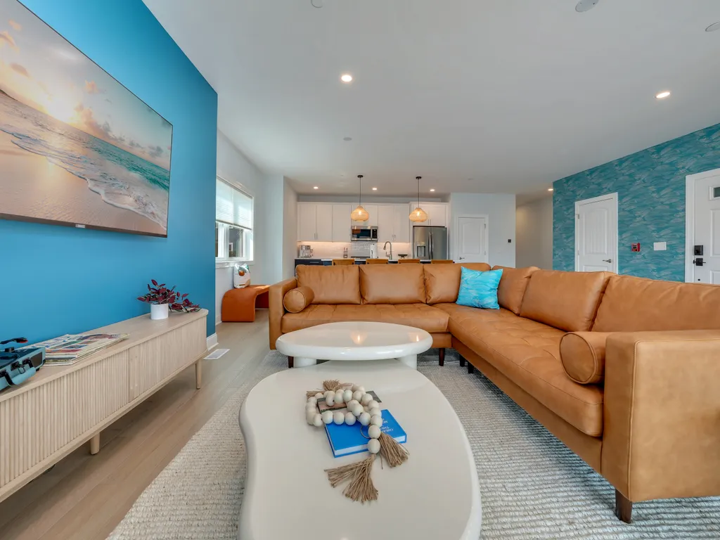 Living Room with Leather Sectional and Game-Ready Coffee Table
