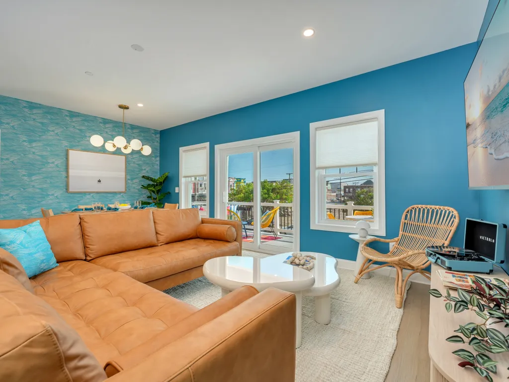 Living Room with Leather Sectional and Game-Ready Coffee Table