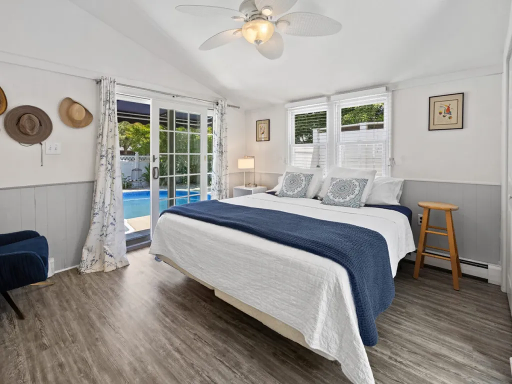 Primary Bedroom w/King bed, ensuite bath &amp;amp; access to pool