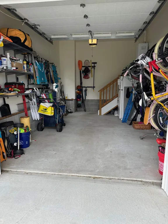 Garage with beach gear and bikes