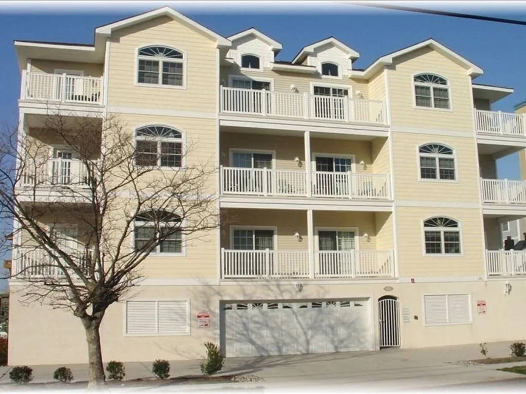 First Floor Center Unit Above Garage