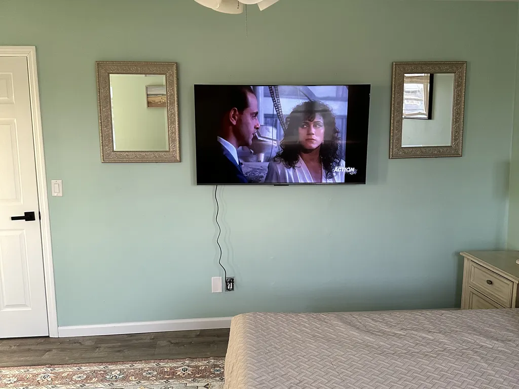 Master bedroom with 55&amp;quot; smart tv
