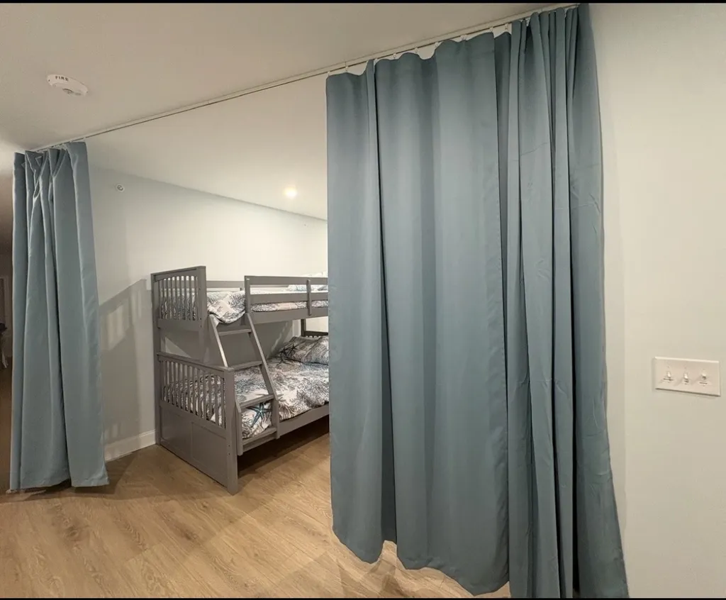 Bunkhouse has a floor to ceiling black out curtain that allows you to separate the space completely, plenty of privacy.  Perfect for all the kids to have a &amp;quot;sleepover&amp;quot; together