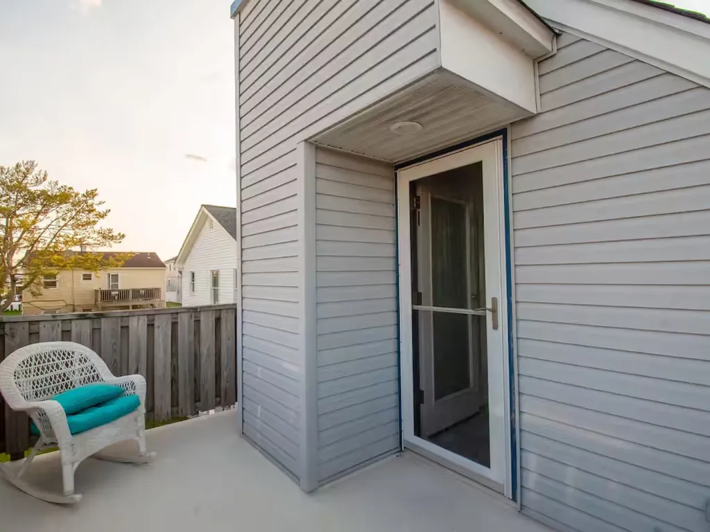 Rear Deck off of the bedroom with full bed is a great place for solitary moments