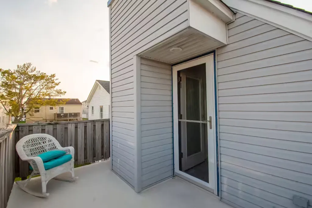 Rear Deck off of the bedroom with full bed is a great place for solitary moments