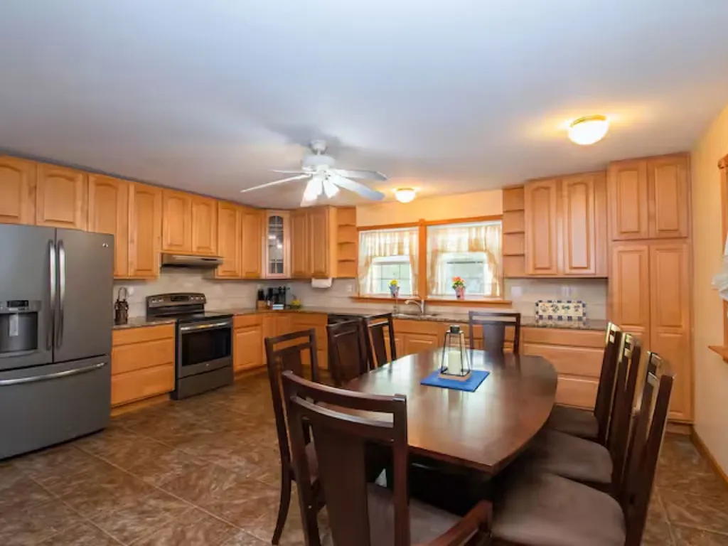 First Floor A large kitchen that is spacious and well-designed culinary haven that offers ample room for cooking, food preparation, and dining