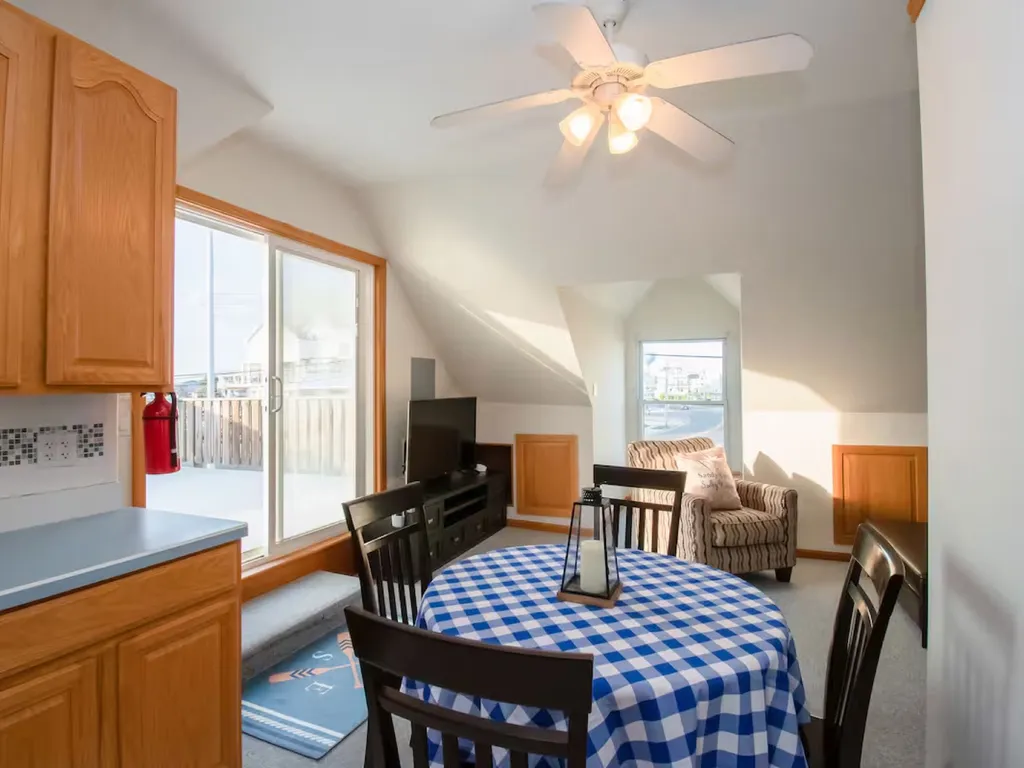 The kitchen eating area provides a cozy and inviting space to enjoy meals with family and friends.