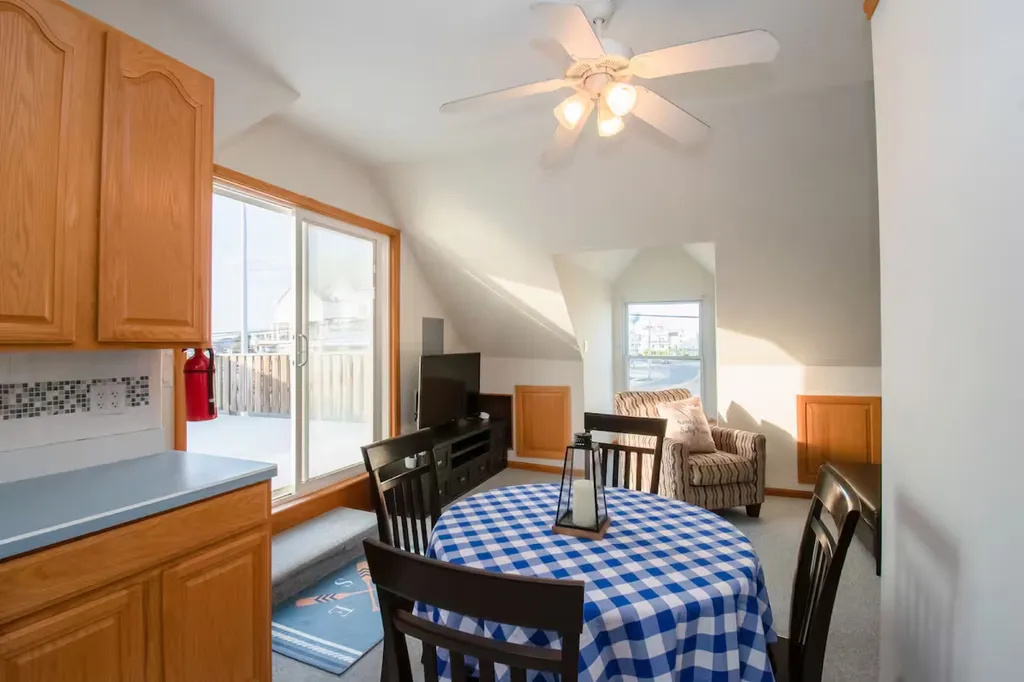 The kitchen eating area provides a cozy and inviting space to enjoy meals with family and friends.