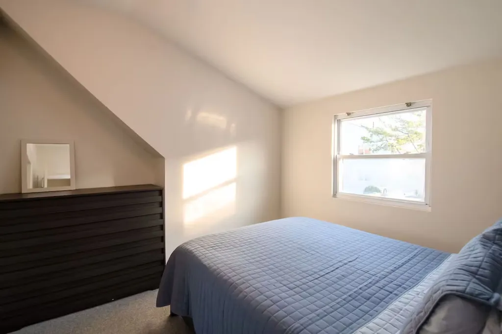 Bedroom with Queen size bed--Black out curtains and new unfrogged window has been added