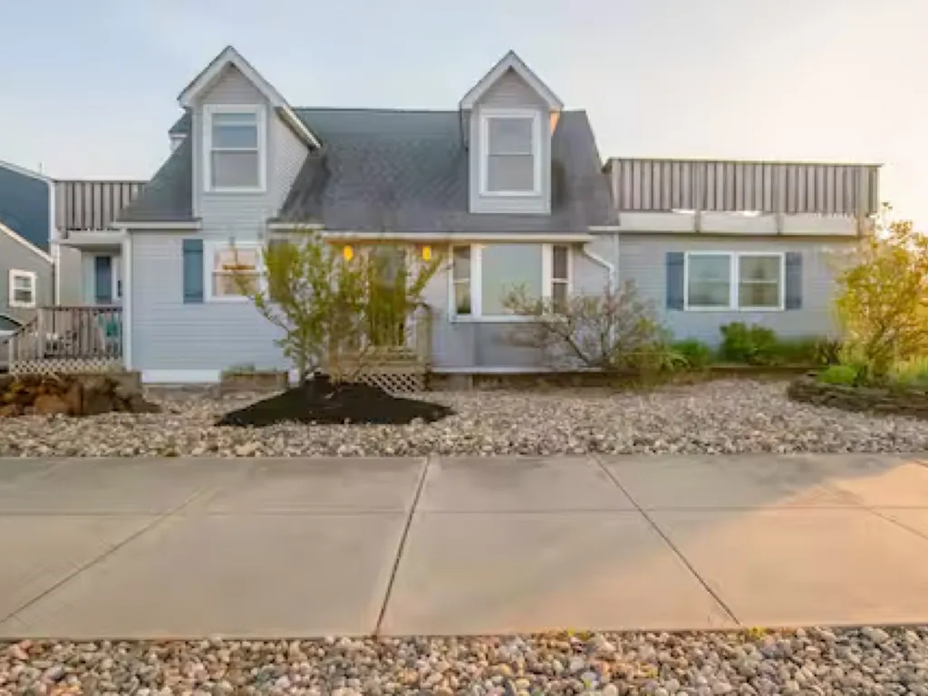 Apartment offers three entrances-off of side deck, front door, and kitchen