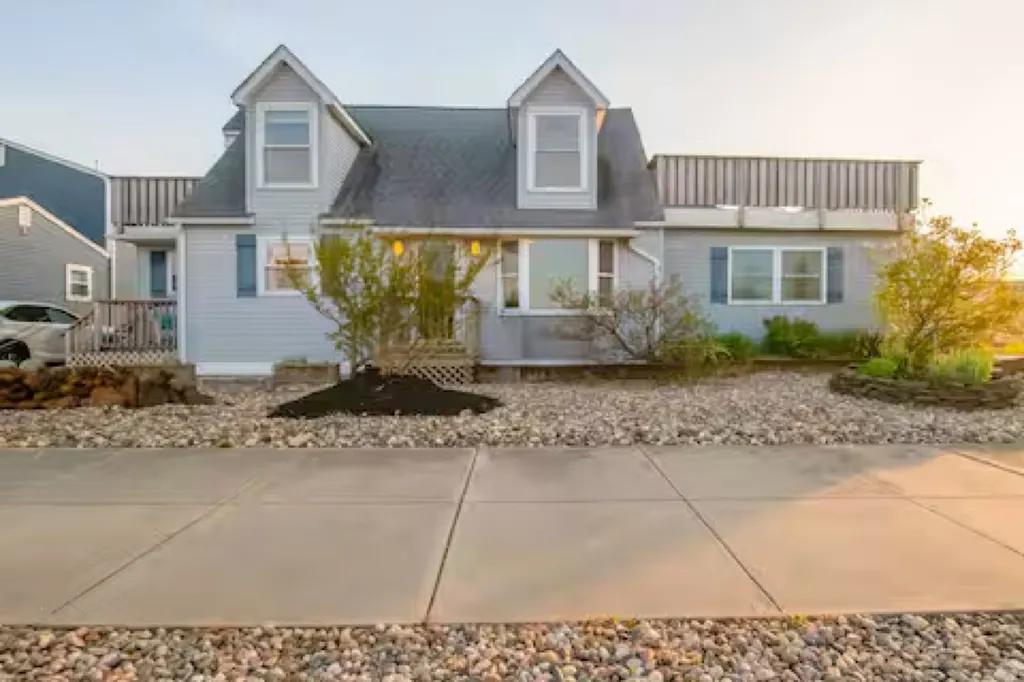 Apartment offers three entrances-off of side deck, front door, and kitchen