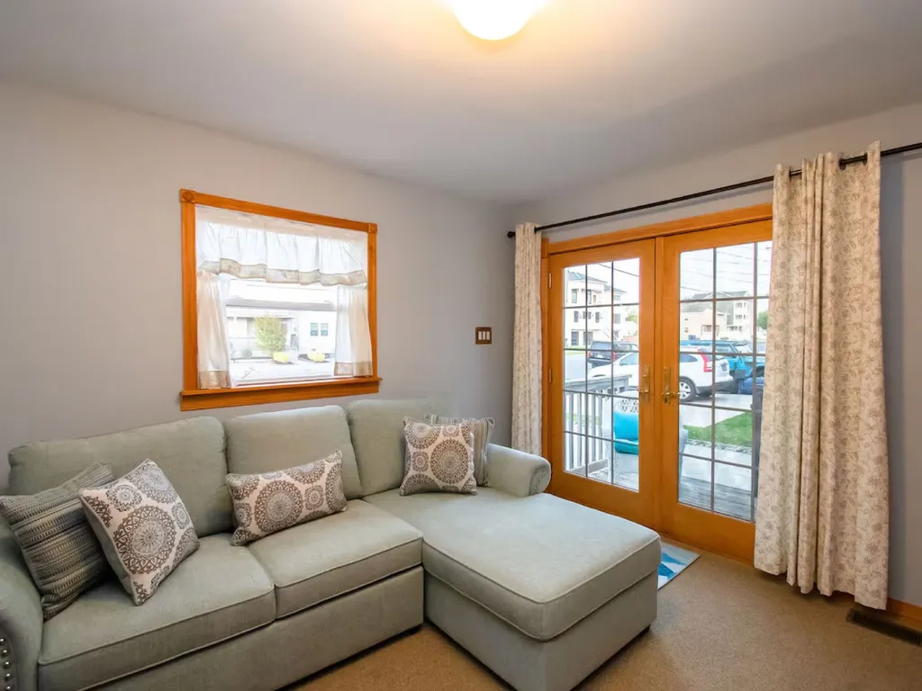 This room is designed to double as a second Family Room and a Bedroom. There is a small deck through the French Doors