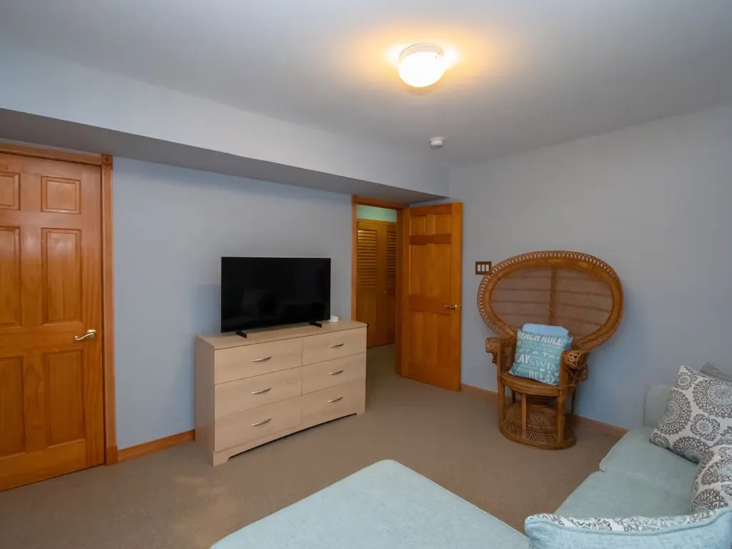 Family room's flat-screen TV with UTube TV and Wi-Fi for streaming your favorite apps
