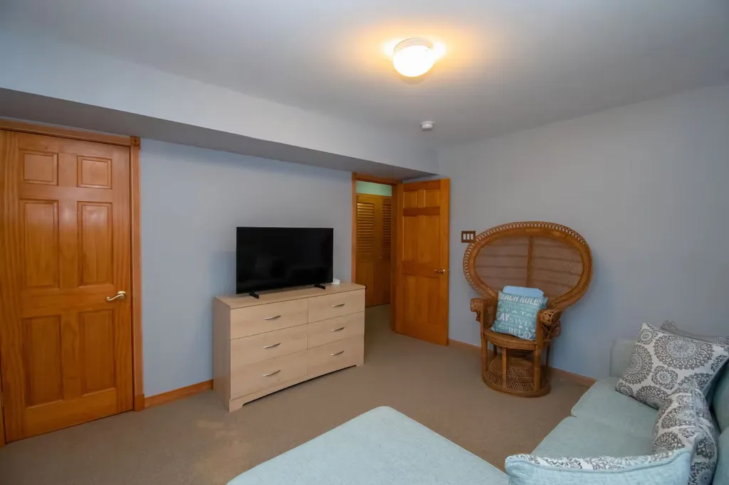 Family room's flat-screen TV with UTube TV and Wi-Fi for streaming your favorite apps