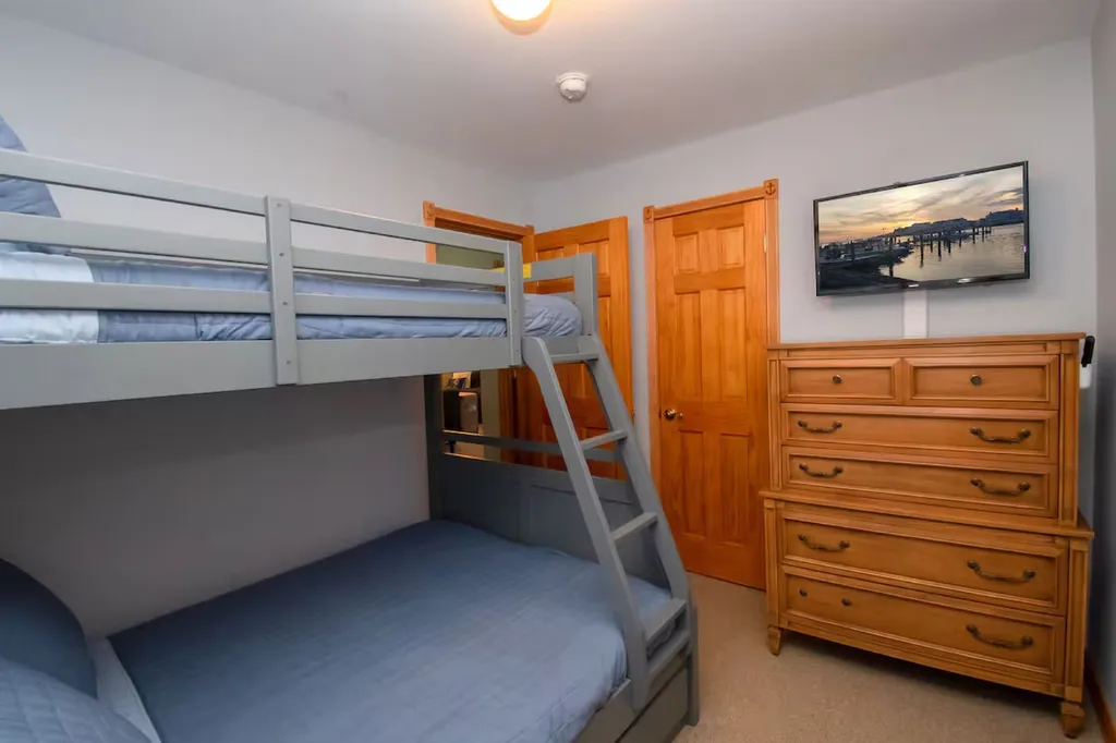This room is designed for kids of all ages-two twin beds, and one full bed. Flat-screen HD TV . Stream your apps