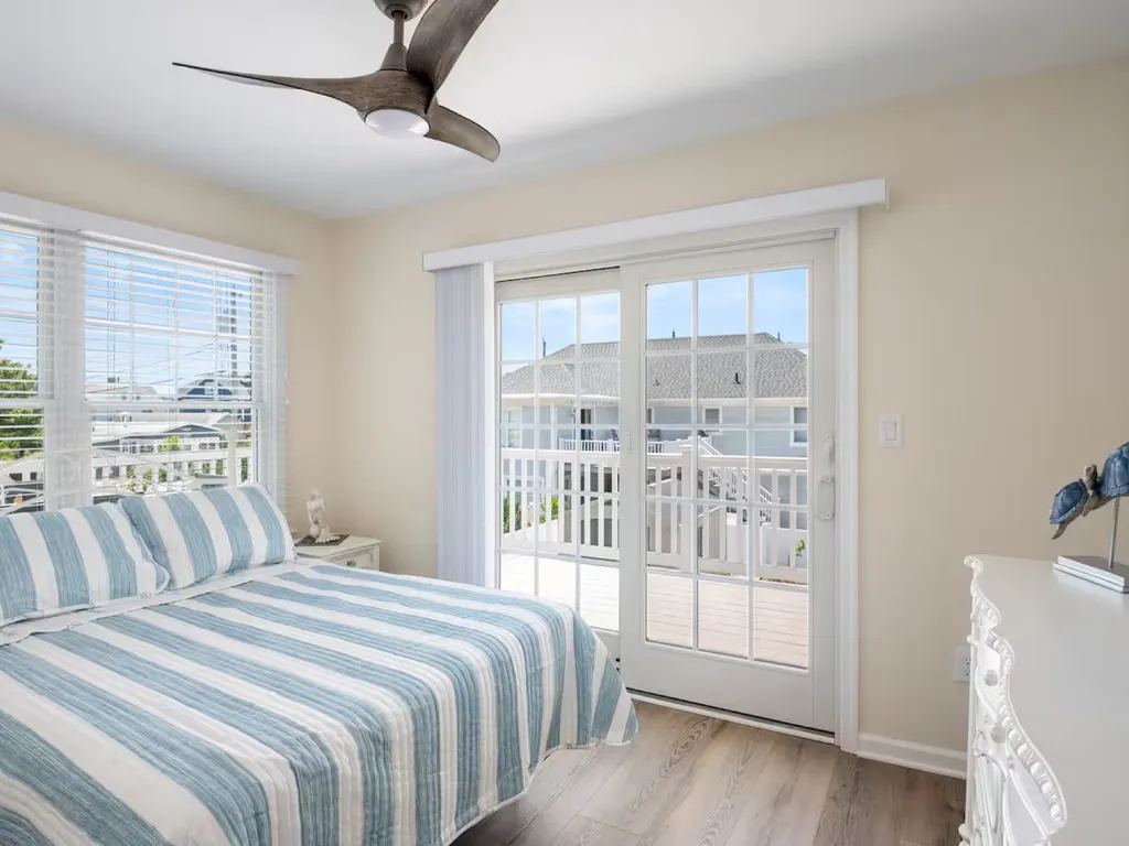 First floor full bed - slider open to backyard deck.
