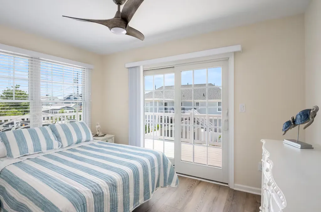 First floor full bed - slider open to backyard deck.