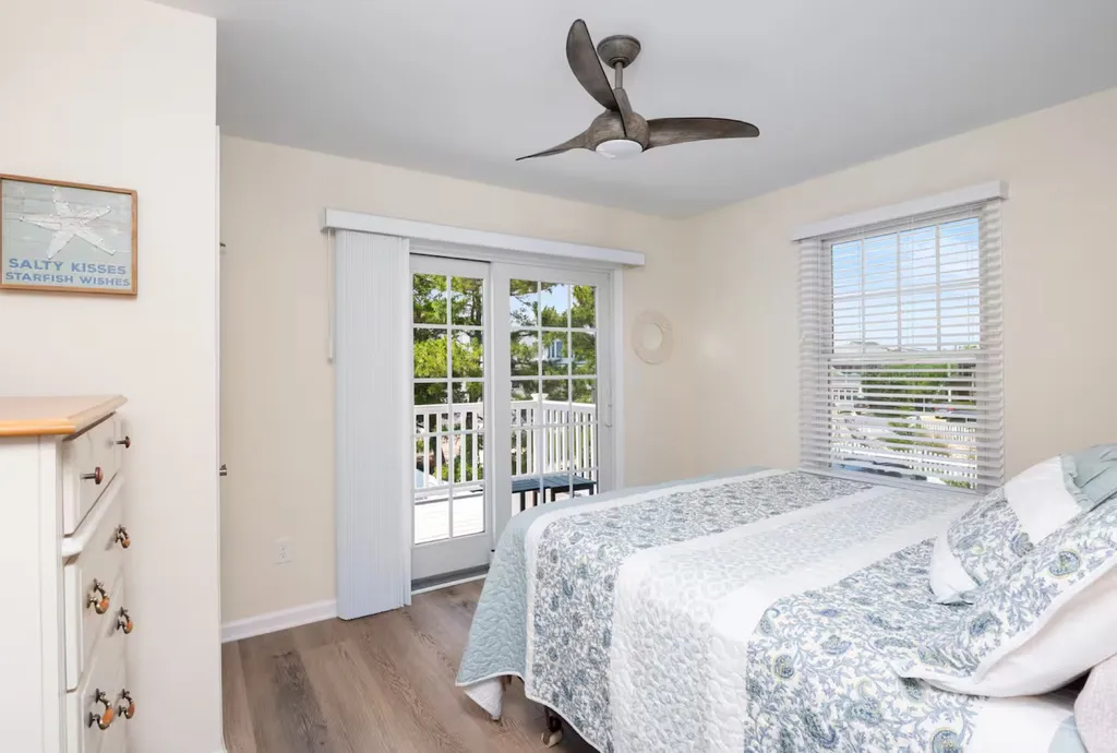 First floor queen bedroom - slder opens to backyard deck.