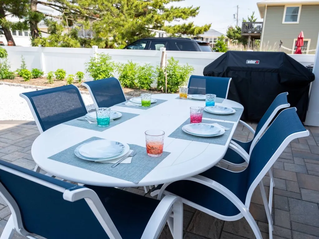 Back yard dining table - umbrella provided.