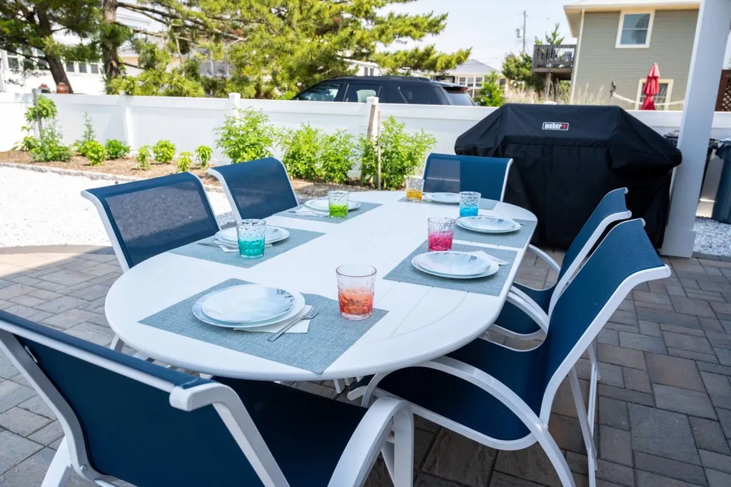 Back yard dining table - umbrella provided.
