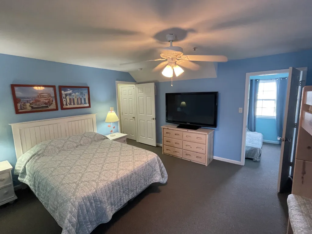 View of 3rd floor bedroom with view of private futon in closet area 
