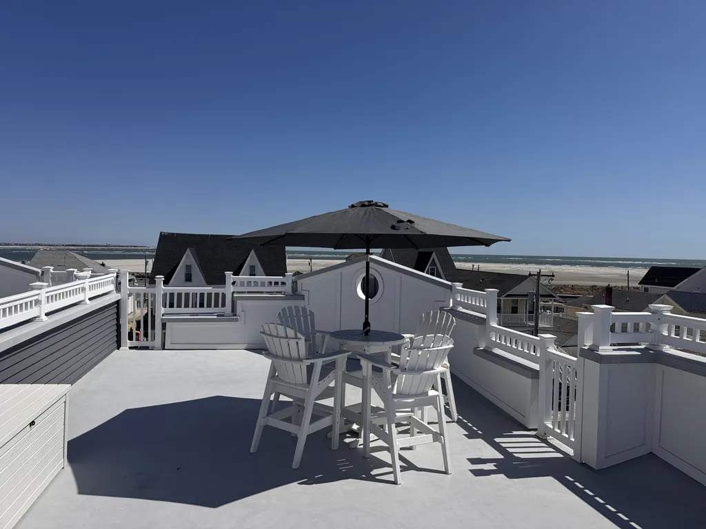 Enjoy your cocktails while sitting at the high top table looking out onto the ocean view