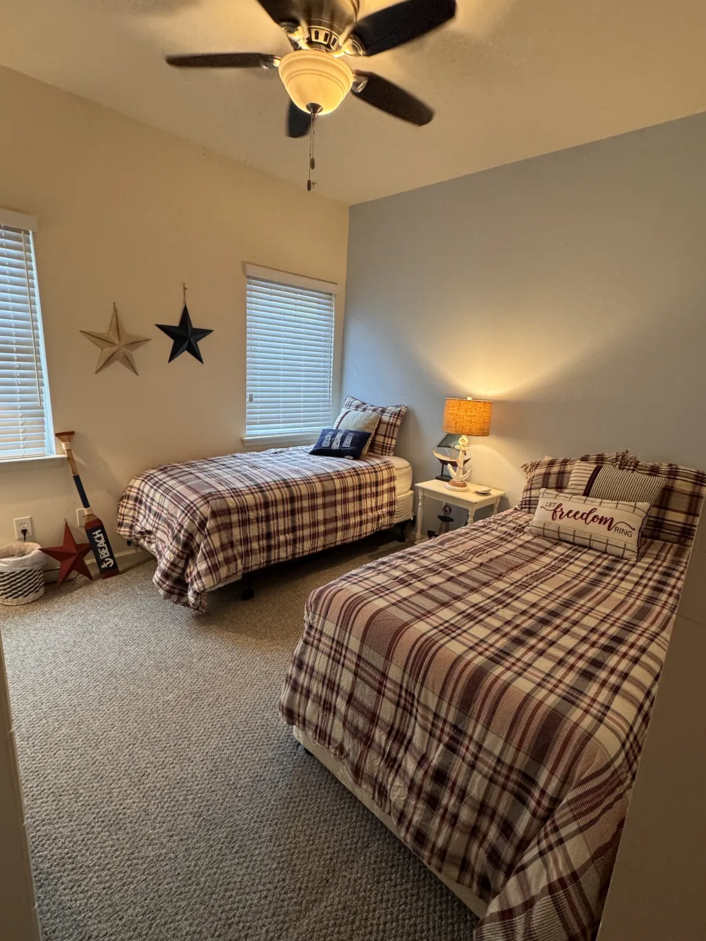 Bedroom #4 is on the main level with two twin beds, power tower on the nightstand and 43&amp;quot; smart TV
