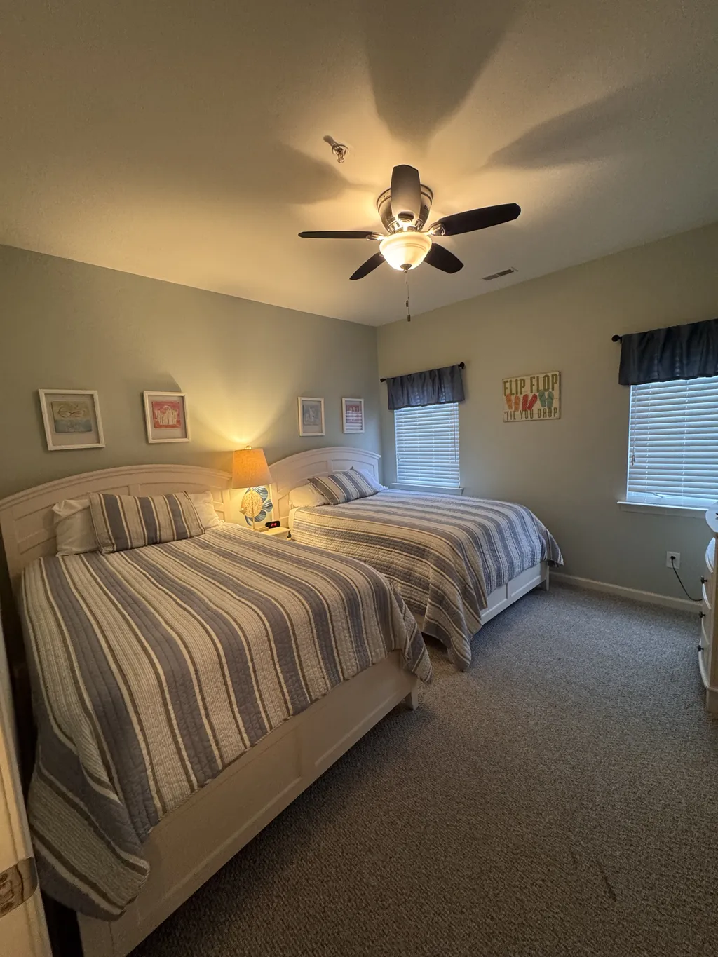 Bedroom #2 with two Full Size beds, a power tower on the nightstand and 43&amp;quot; smart TV