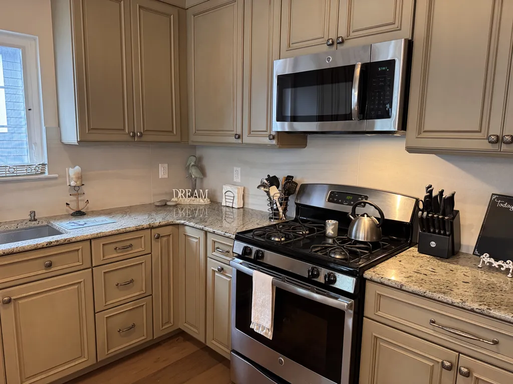 Stainless steel oven and microwave and lots of counter space