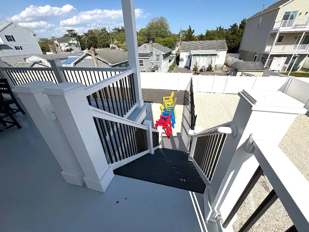 Steps from 2nd Level Deck to Pool Yard
