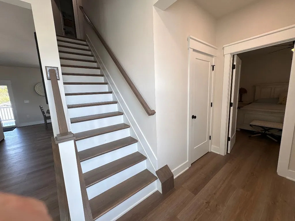 Entryway and view to 1st Level King Bedroom and Full Hall Bath