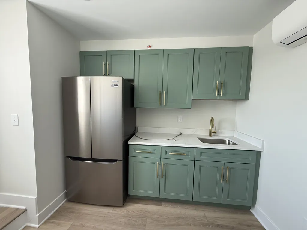 Shared rooftop wet bar area