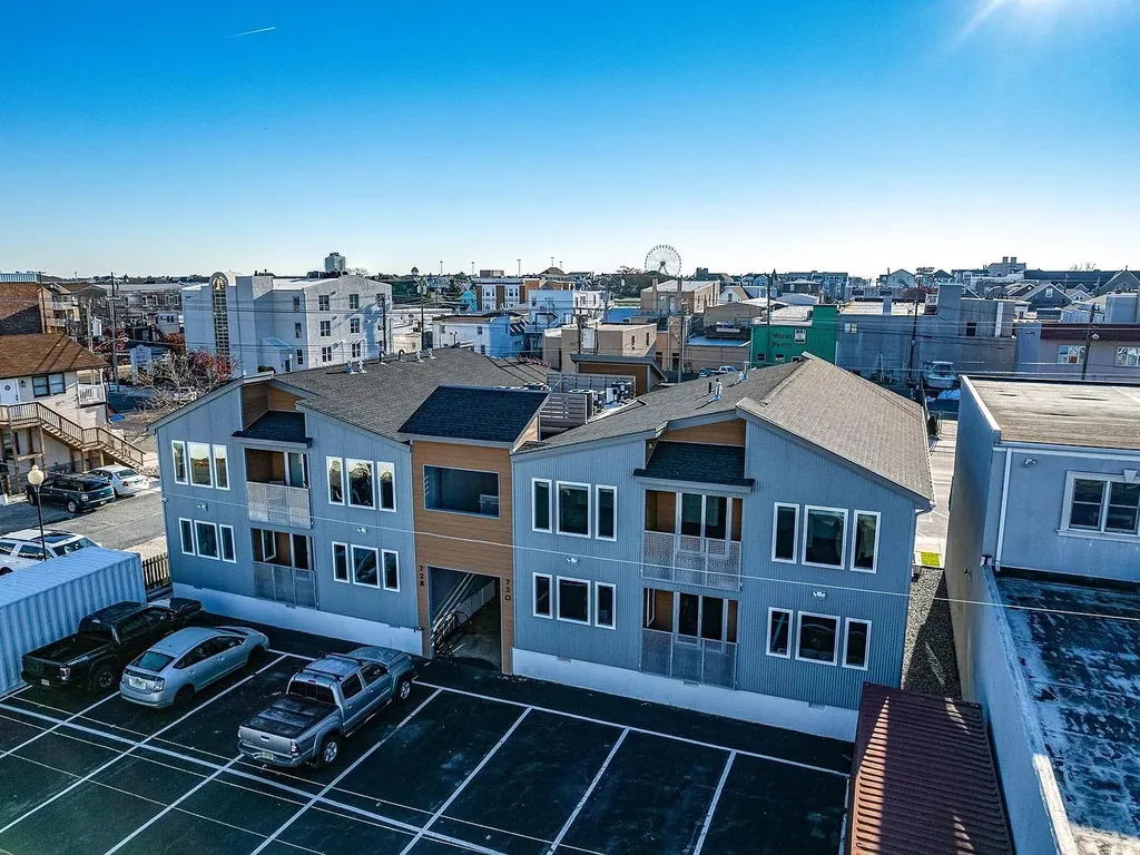 2 parking spots included rear of building