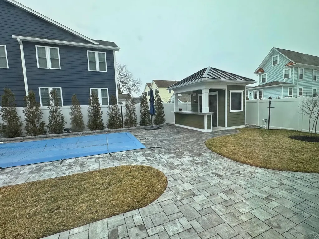 Pool, cabana, back yard