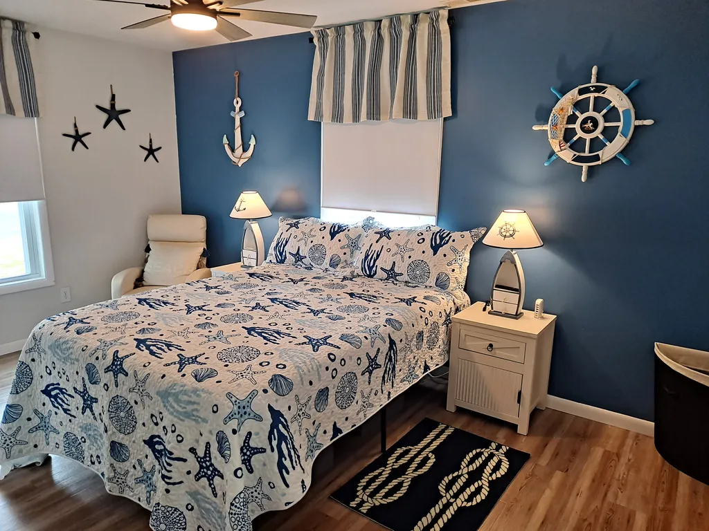 Coastal comfort awaits in the master suite with a private ensuite full bath.