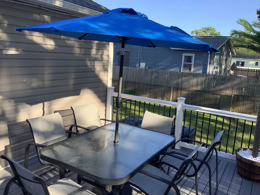 Relax and dine outside on the spacious deck with plenty of seating.