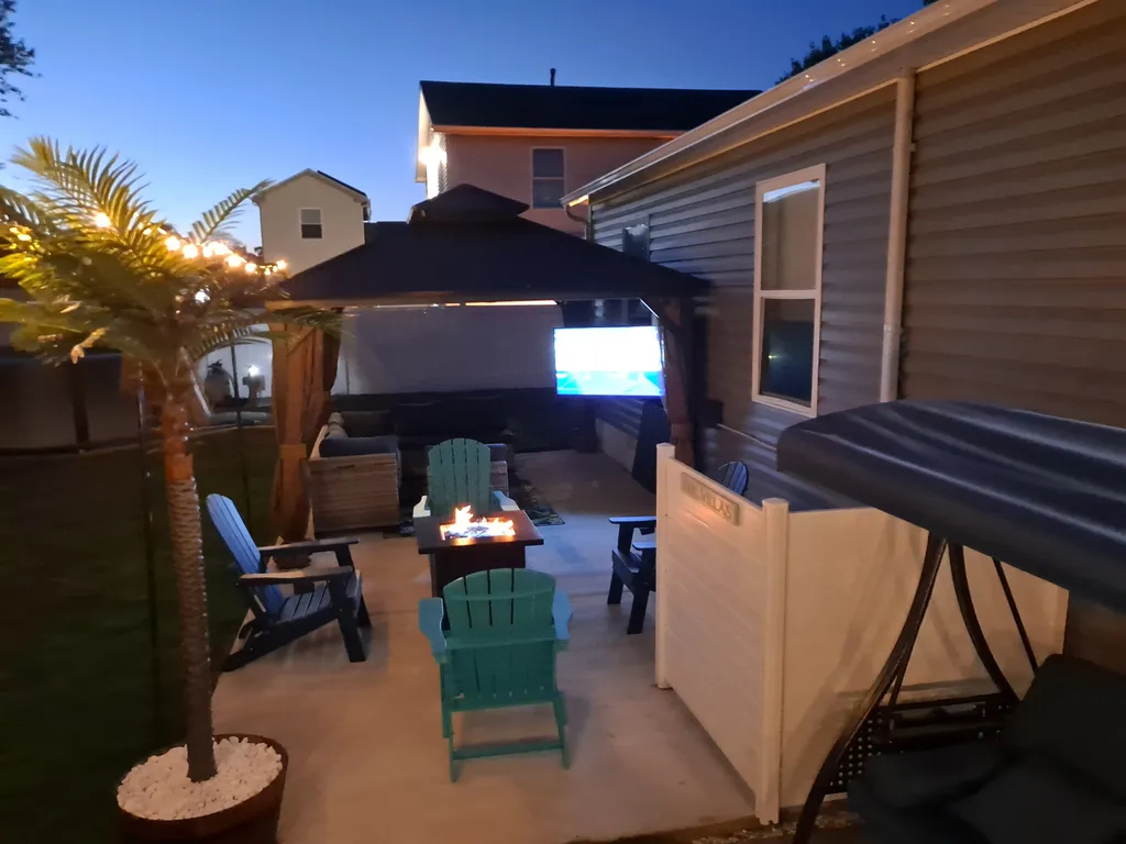Enjoy outdoor living with a cozy gazebo, patio seating, and plenty of backyard space.