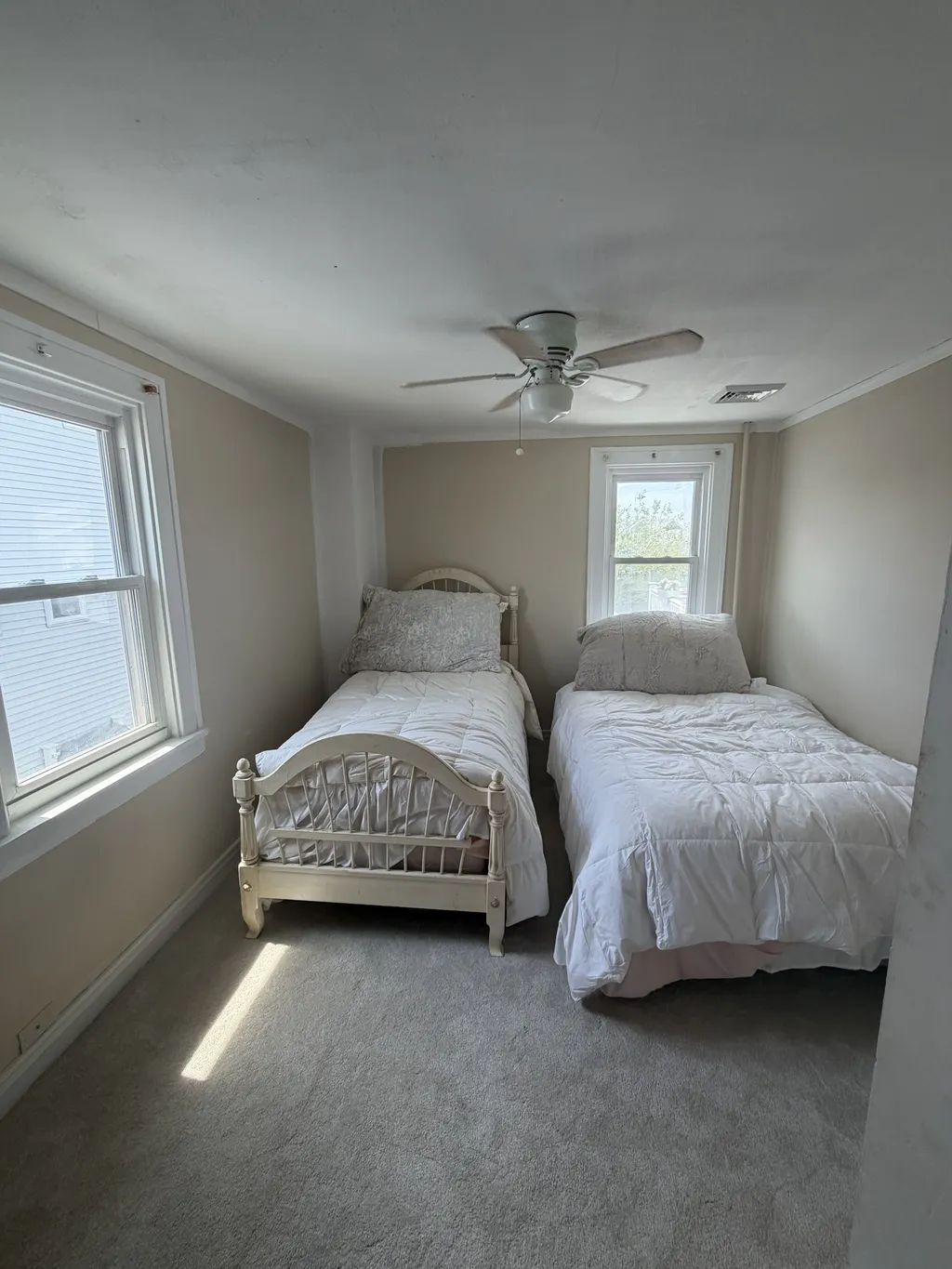 Upstairs bedroom with closet and dresser
