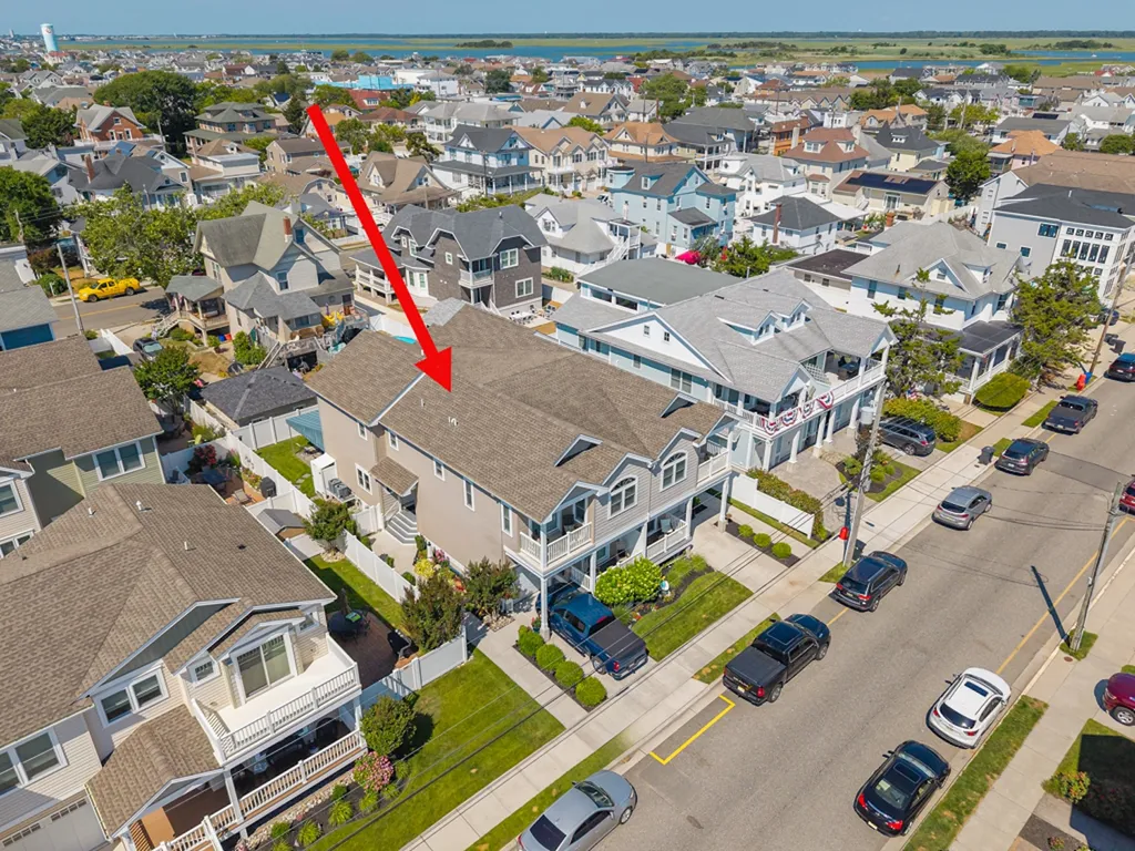 AERIAL VIEW OF HOUSE ON LEFT